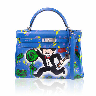 Hermes Birkin bags that Alec Monopoly has painted 