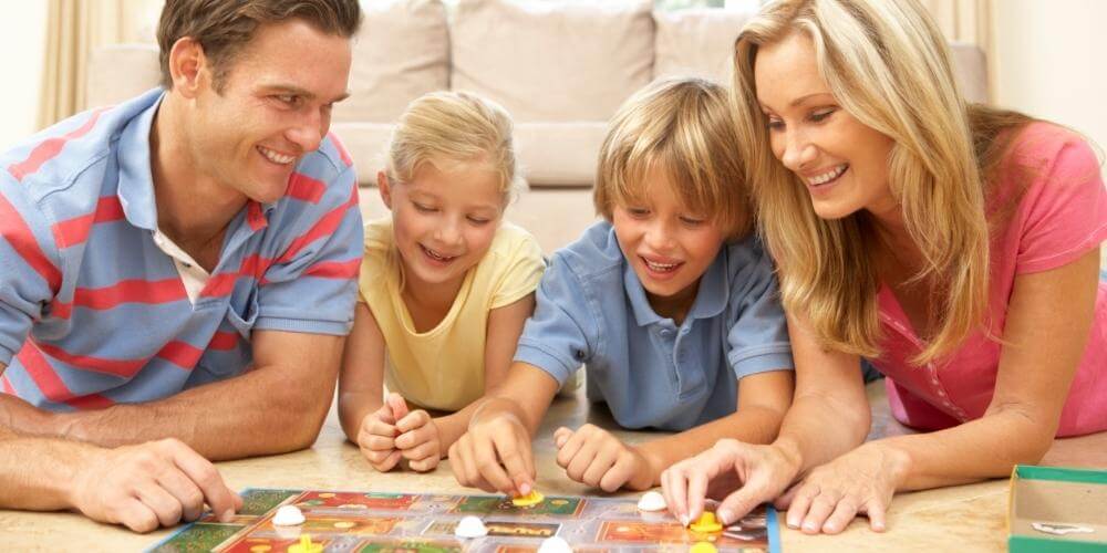 Family playing a board game