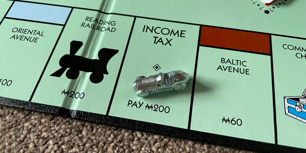 Monopoly Income Tax Rules Explained - Monopoly Land
