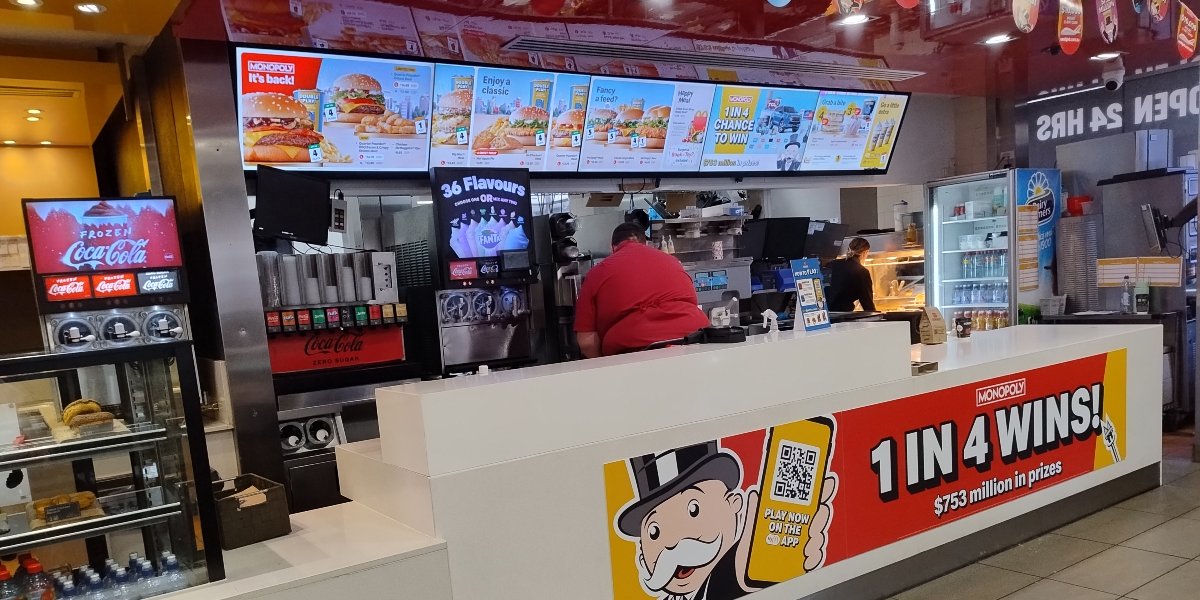 Maccas counter with Monopoly