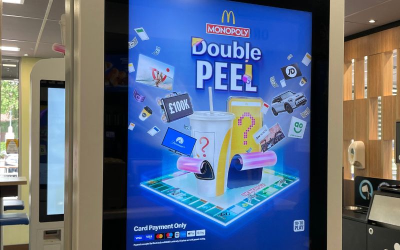 McDonald monopoly double peel on screen