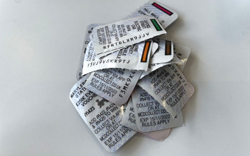 pile of McDonalds Monopoly stickers