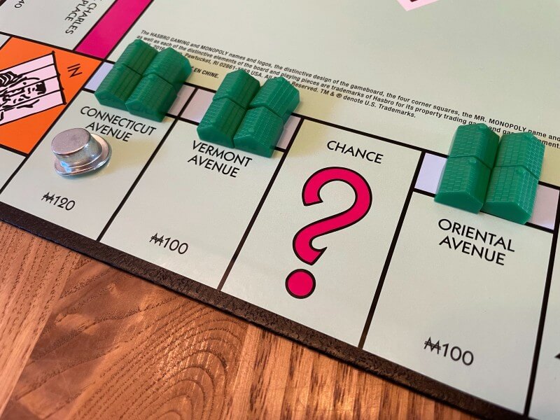 buying houses in Monopoly