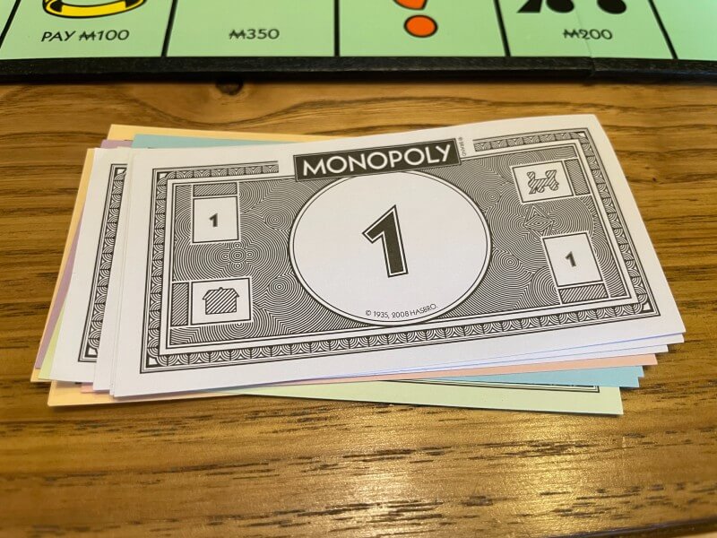 stack of Monopoly money