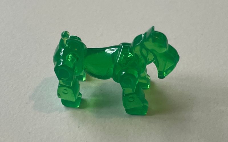 Green plastic robot dog in Monopoly