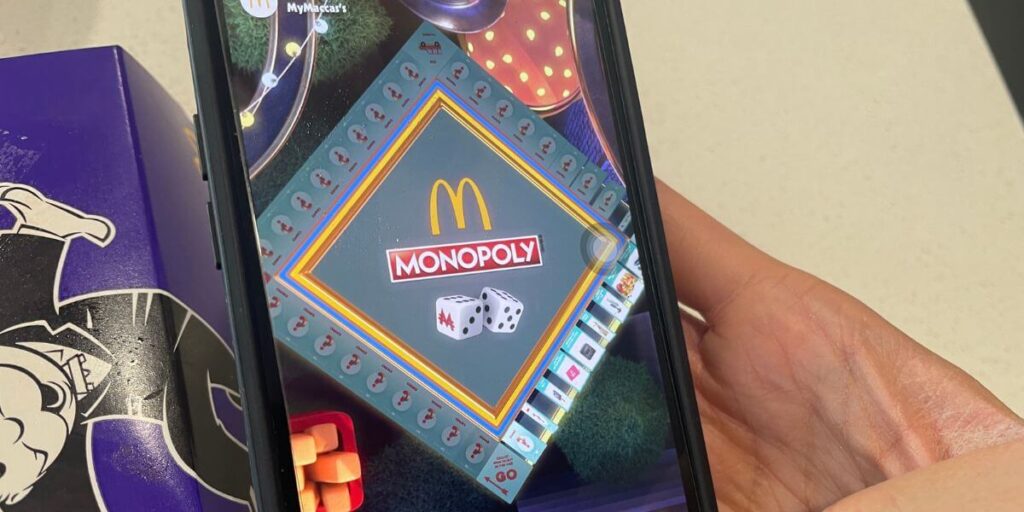 macca's monopoly app displayed on the phone