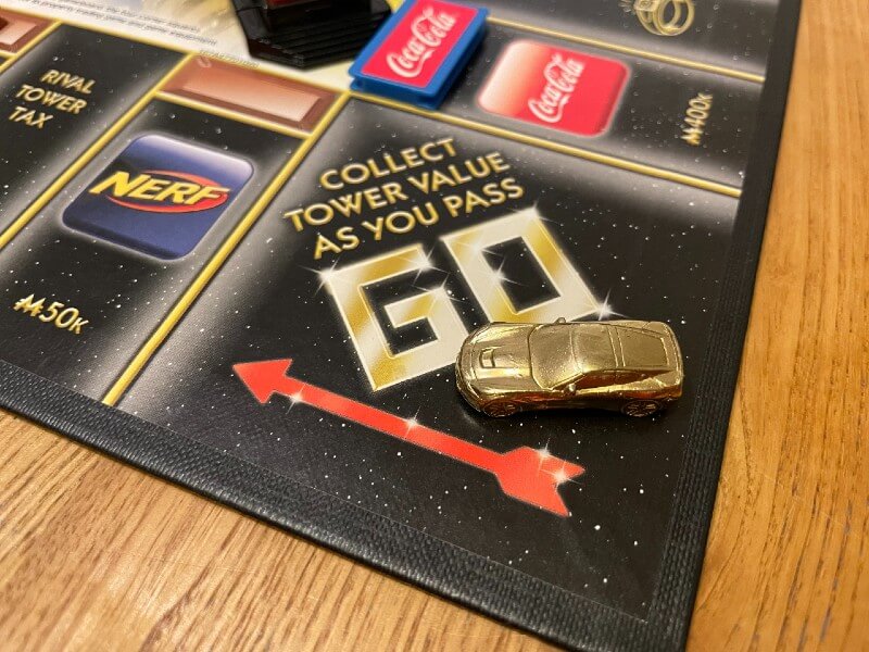 passing go Monopoly Empire board