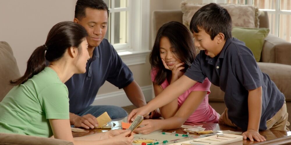 playing Monopoly with kids